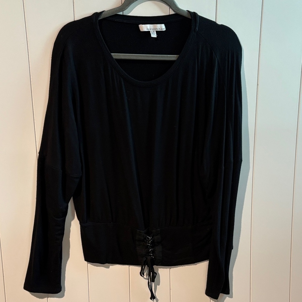 Fourteenth Place black drop shoulder top with lace up detail at waist soft L